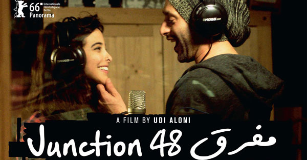 movie poster for junction 48, man and woman in a recording studio with headphones on smiling at each other