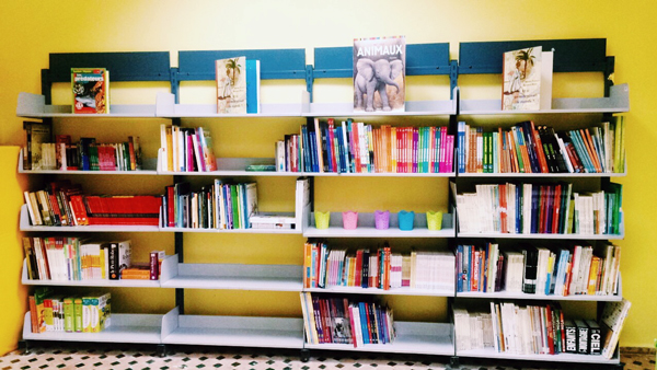 Children's section bookshelf in library in Morocco. 