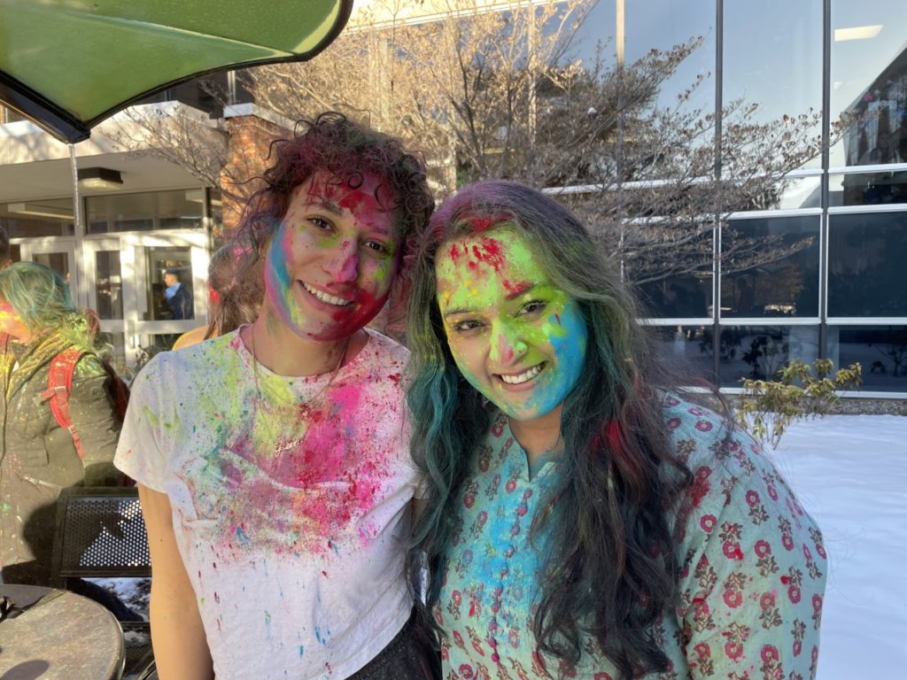 two women with colors on their faces
